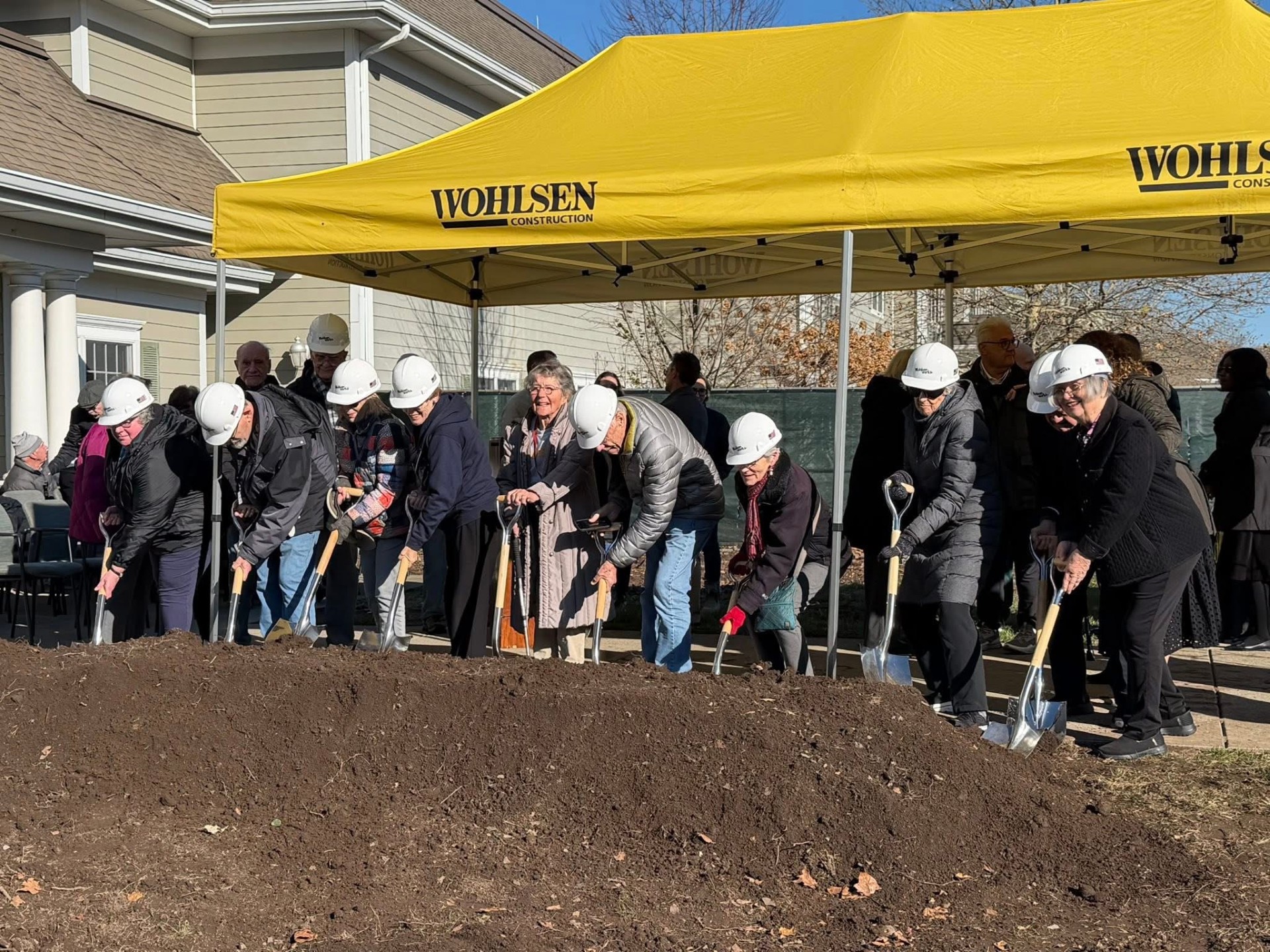 Resident donors "breaking ground" on our new performing arts center.