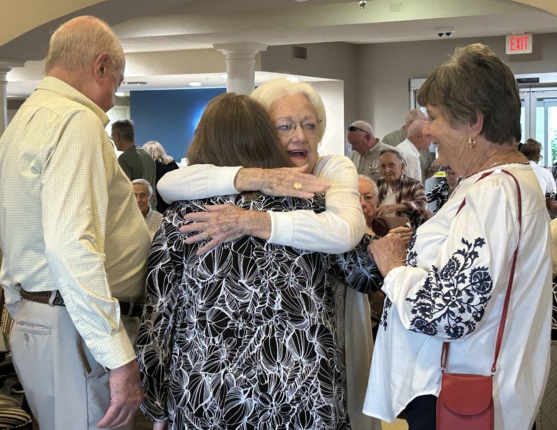 Teammates come together to celebrate the retirement of a beloved teammate who worked at St. Joseph Village for 25 years