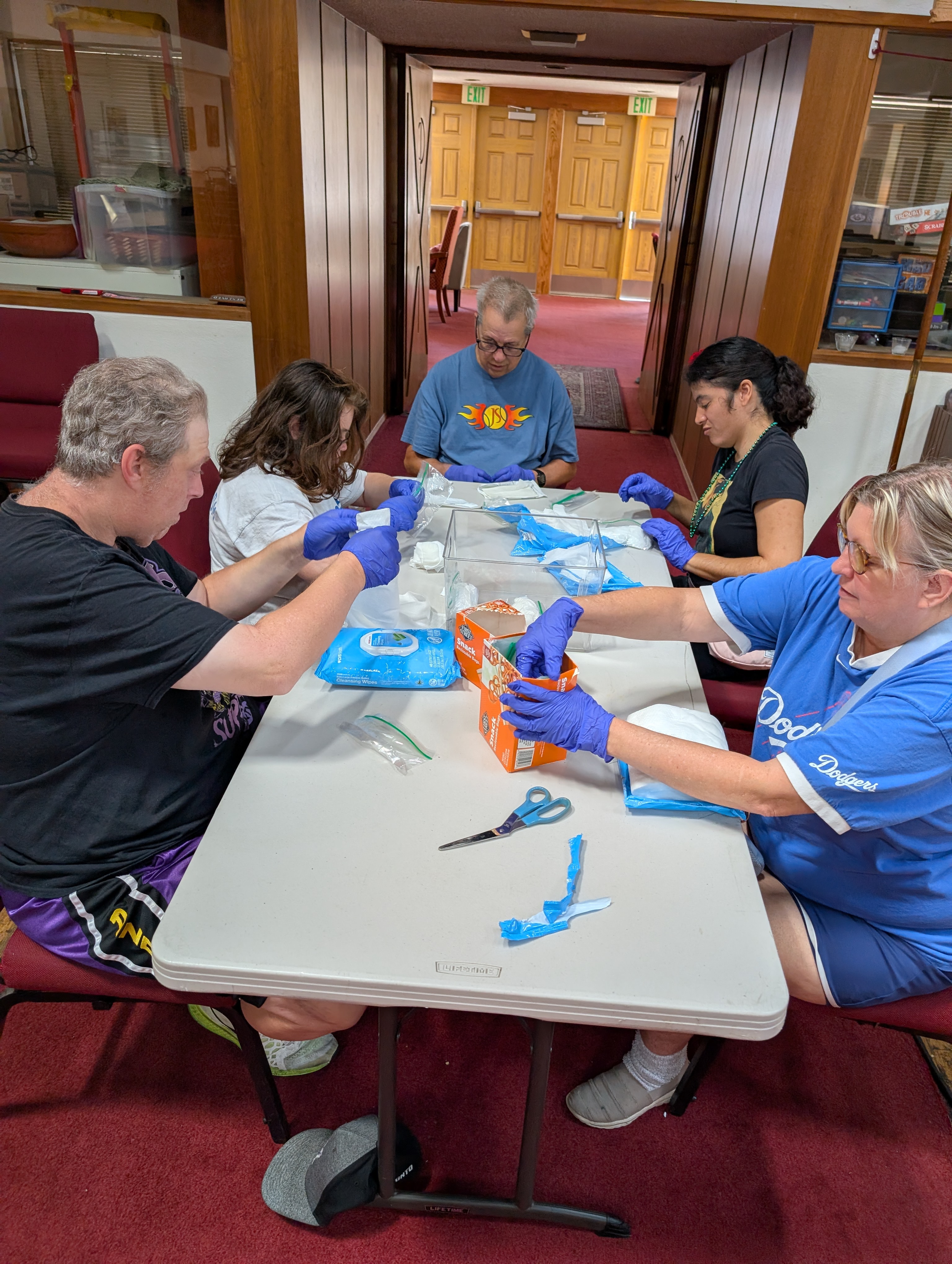 Participants work together on a volunteer project, building skills while giving back.