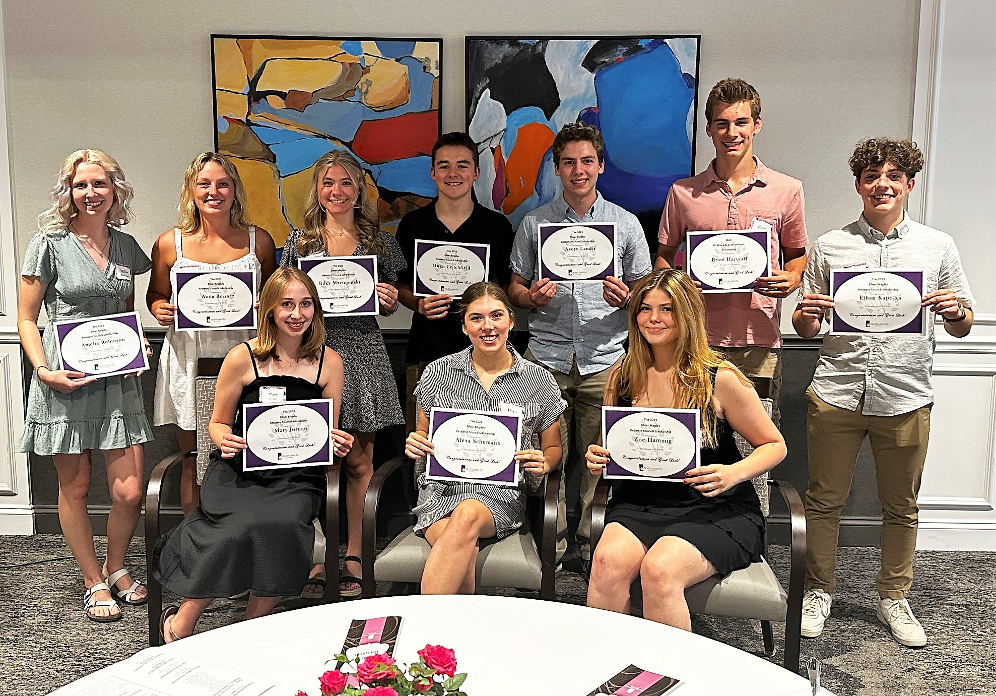 Employees celebrating our resident funded Scholarships! $169,650 awarded in the past 5 years!
