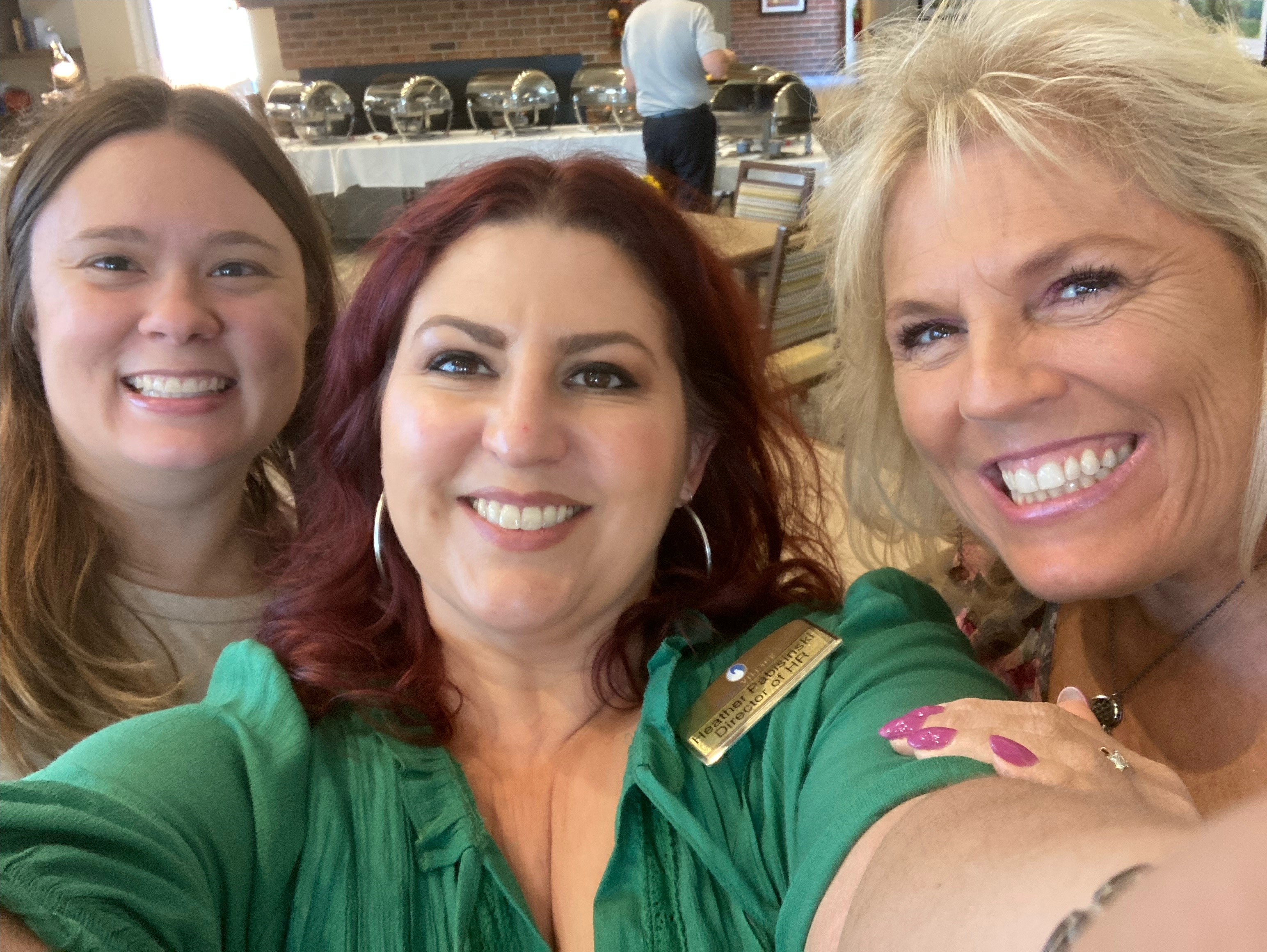 Grateful and full! Michele, Kim, and Heather enjoying the Thanksgiving Luncheon.